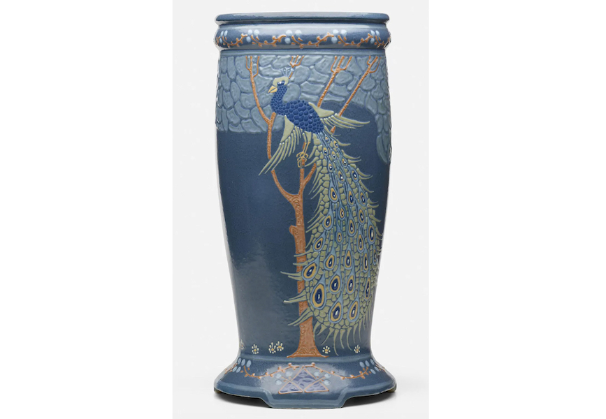 Frederick Hurten Rhead designed this umbrella stand with peacock decoration for Roseville, but the decoration was executed by his brother, Harry. It made $3,500 plus the buyer’s premium in November 2022. Image courtesy of Toomey & Co. Auctioneers and LiveAuctioneers.