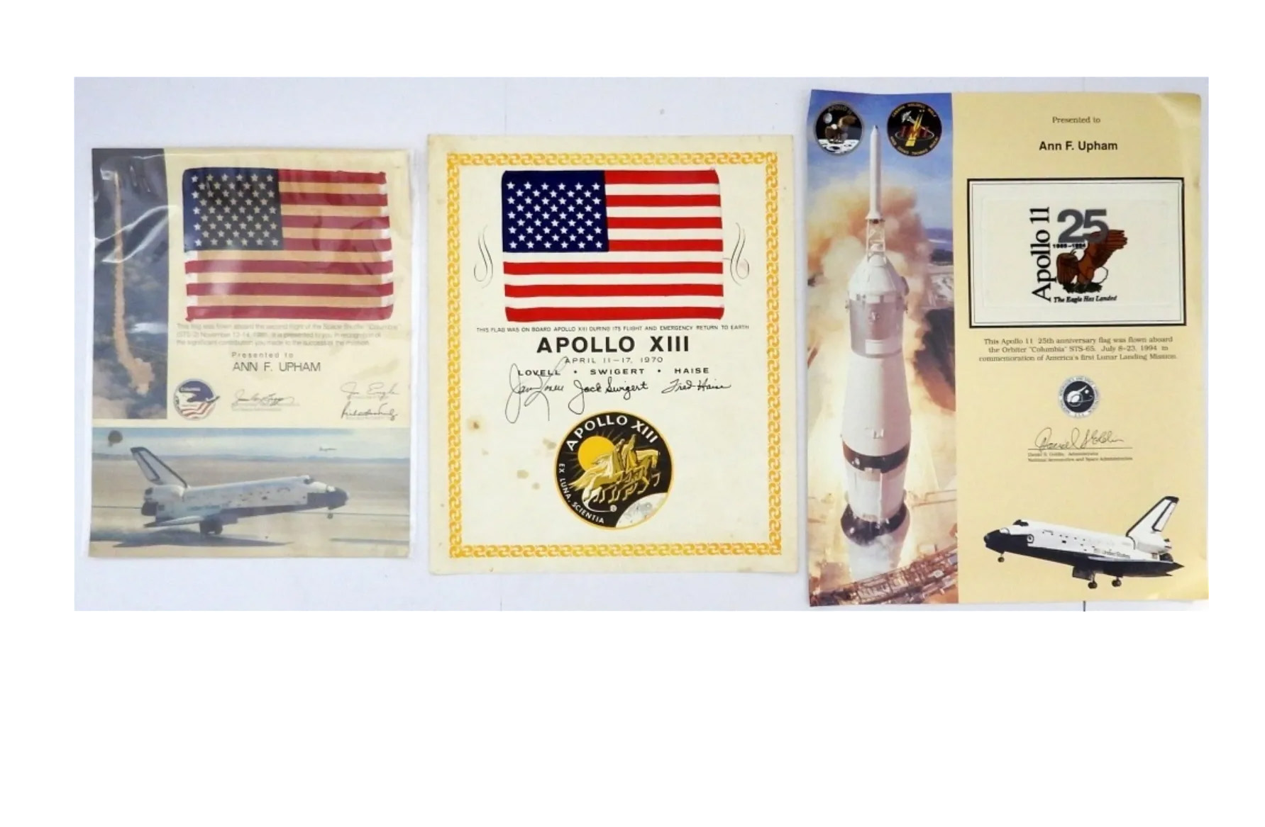 Space-flown American flags from Apollo 13 and shuttle missions, plus additional memorabilia, $5,100 ($5,992 with buyer's premium) at Vintage Auctions.