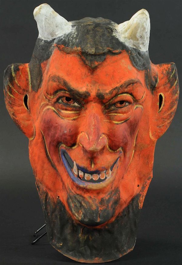 A larger-than-life-size Krampus head mask, described as “evil” and looking very much like a red devil, sold for $2,000 plus the buyer’s premium in November 2020. Image courtesy of Bertoia Auctions and LiveAuctioneers.