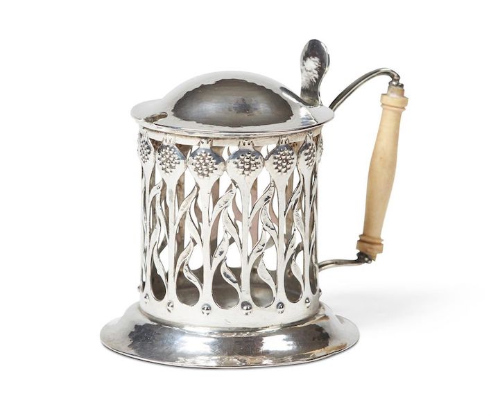 An unmarked circa-1910 Arts and Crafts chased and pierced silver and ivory mustard pot attributed to Charles Robert Ashbee realized £2,200 ($2,790) plus the buyer’s premium in October 2023. Image courtesy of Dreweatts Donnington Priory and LiveAuctioneers.
