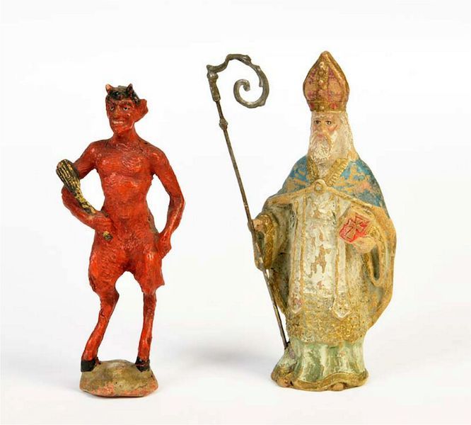 A pair of vintage figures of Krampus and St. Nicholas sold for €950 (about $1,000) plus the buyer’s premium in September 2019. Image courtesy of Antico Mondo Auktionen and LiveAuctioneers.