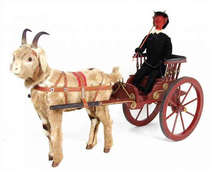 A vintage Krampus figure riding in a cart pulled by a goat sold for €3,100 (about $3,300) plus the buyer’s premium in October 2016. Image courtesy of Ladenburger Spielzeugauktion GmbH and LiveAuctioneers.