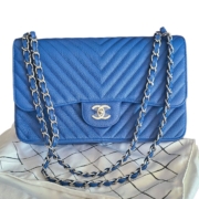 Chanel Timeless Jumbo handbag in blue leather, never worn, estimated at $8,000-$10,000 at Jasper52.