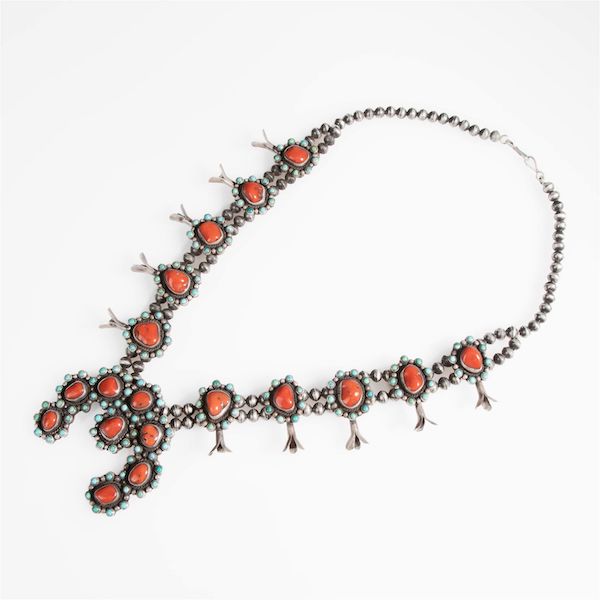 This circa-1950 squash blossom necklace by Zuni artist Dan Simplicio features sterling silver and coral accented with turquoise. It went for $2,500 plus the buyer’s premium in November 2023. Image courtesy of Santa Fe Art Auction and LiveAuctioneers.