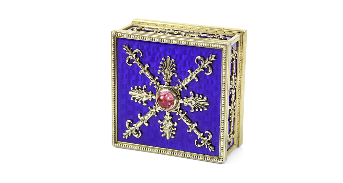 Silver and enamel trinket box by Faberge, the central stone a pink topaz, £8,000 from the Antique Enamel Company