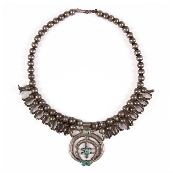 This Navajo silver squash blossom necklace earned $16,000 plus the buyer’s premium in June 2022. Image courtesy of Jeffrey S. Evans & Associates and LiveAuctioneers.