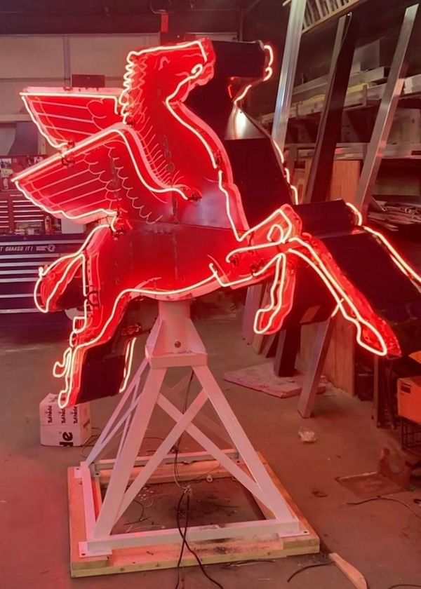 A winged Pegasus porcelain and neon double-signed sign for Mobil, standing 103in tall, made $80,000 plus the buyer’s premium in July 2023. Image courtesy of Richmond Auctions and LiveAuctioneers.