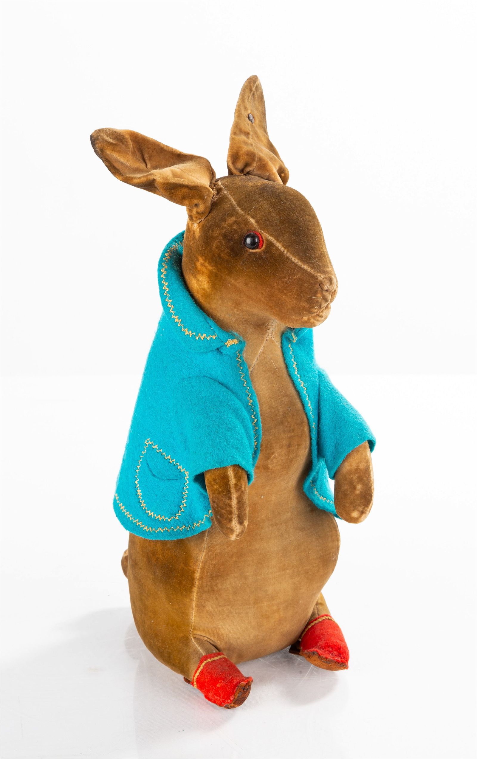 Circa-1910 Beatrix Potter Peter Rabbit stuffed animal by Steiff, with a metal Steiff button in one ear, which sold for $9,500 ($11,875 with buyer’s premium) at Cottone.