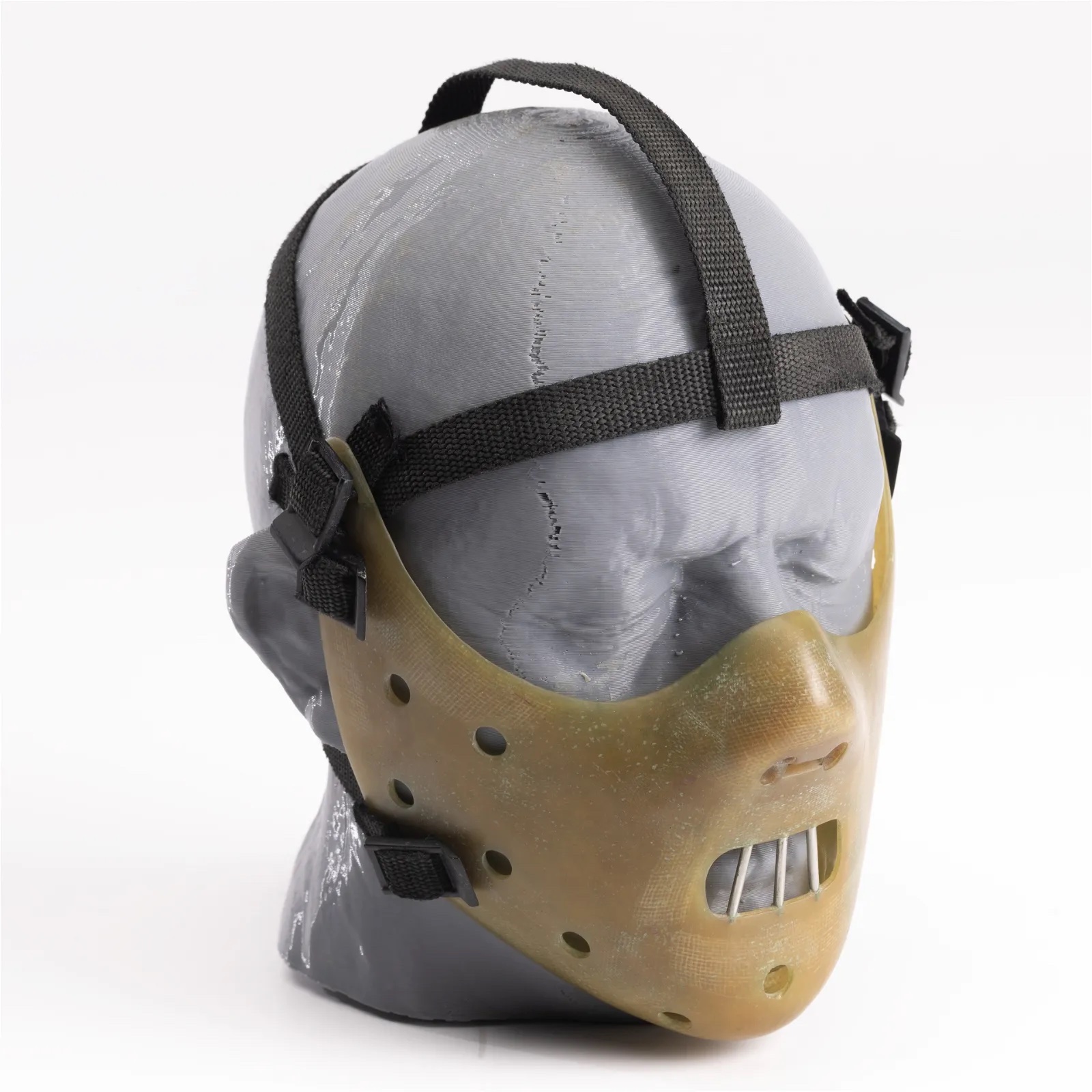 Screen-worn bite-restraint mask of Hannibal Lecter from 'Silence of the Lambs,' which sold for $170,000 ($221,000 with buyer’s premium) at Studio Auctions.