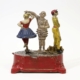 Circa-1907 J & E Stevens Clown, Harlequin, and Columbine cast-iron mechanical bank, which sold for $14,080 at Alderfer Auction.