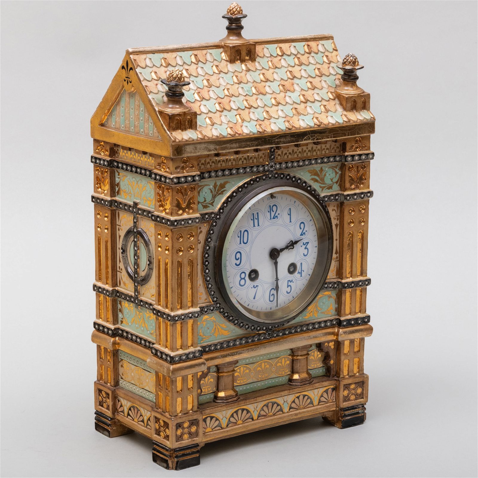 Royal Doulton stoneware clock to a design by William Burges, dating to 1888 and estimated at $1,200-$1,800 at Stair Galleries.
