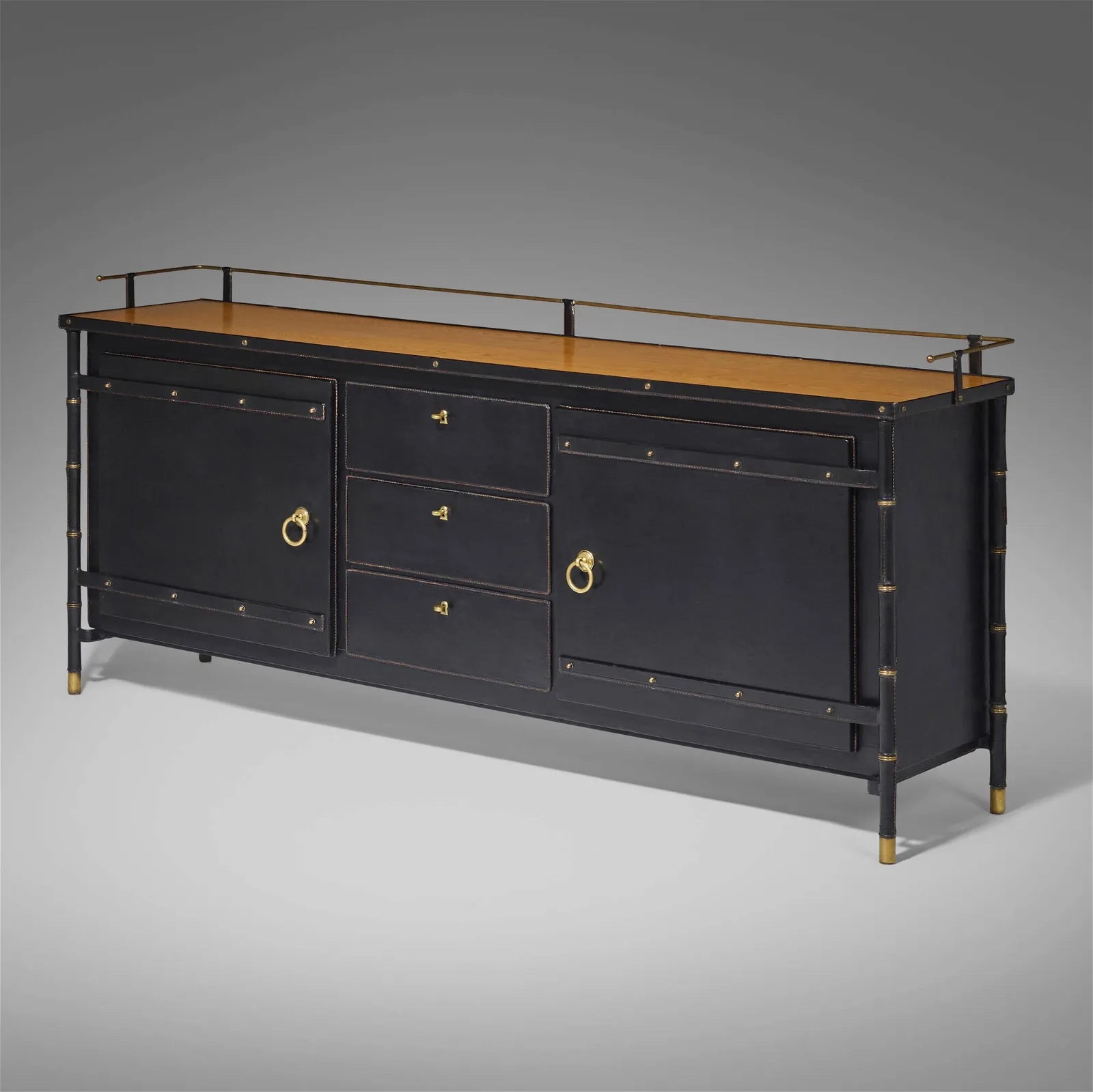 Jacques Adnet sideboard cabinet, which sold for $35,000 ($45,850 with buyer’s premium) at LAMA.