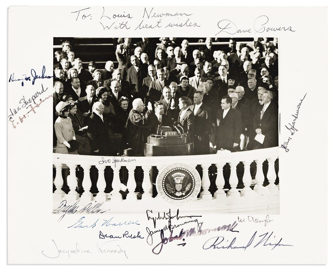Group photograph at the inauguration ceremony of John F. Kennedy signed by 15 attendees, including Jacqueline Kennedy, Lyndon Johnson, Earl Warren, and Richard Nixon, estimated at $3,000-$4,000 at Swann Galleries.