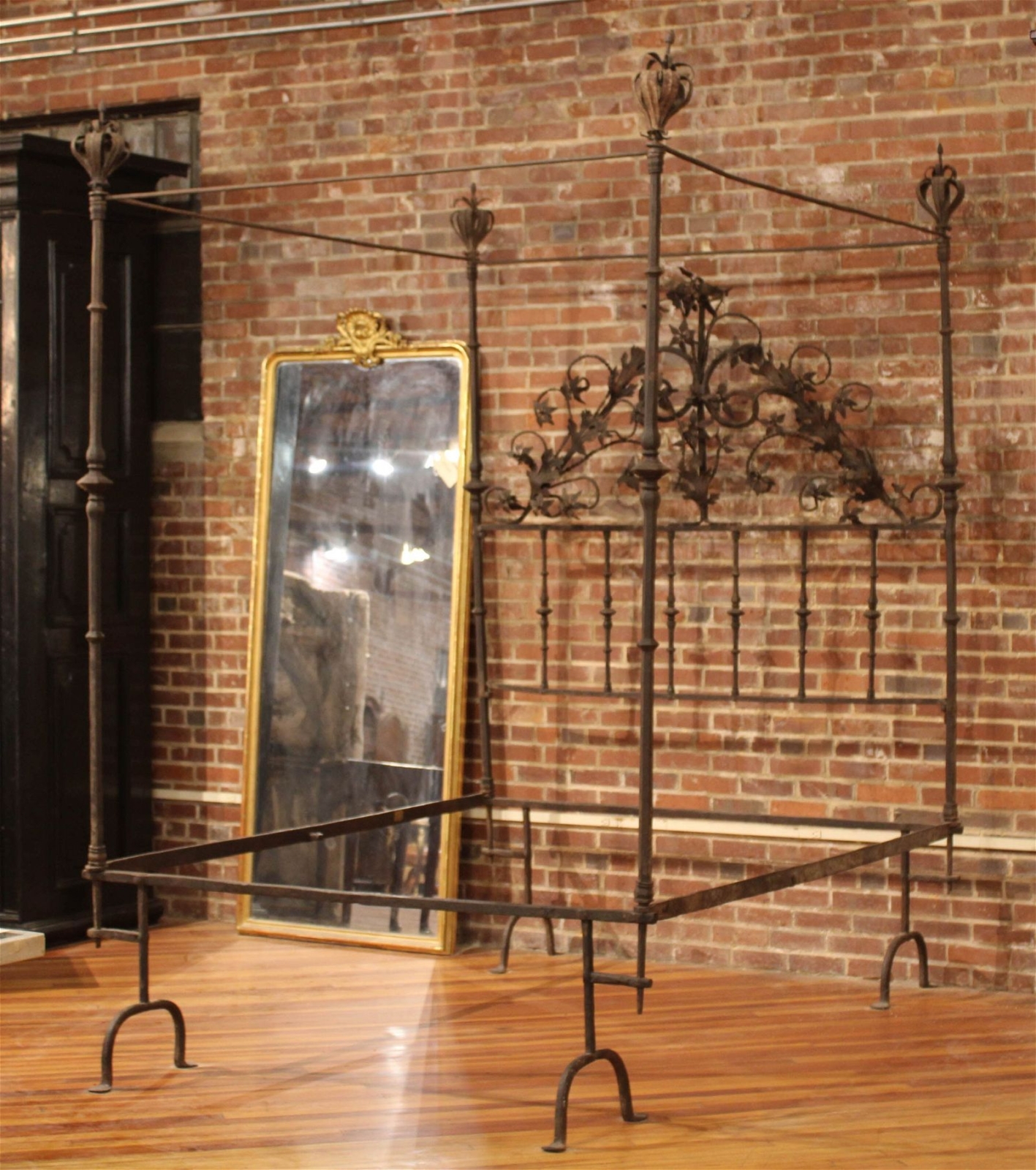 Italian 17th-century wrought iron four-poster bed, estimated at $1,000-$10,000 at Ashcroft and Moore.