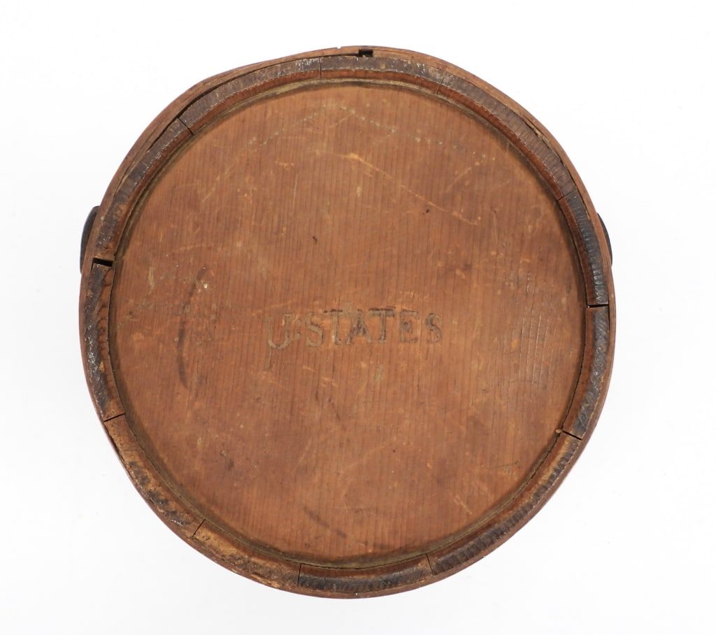 Revolutionary War-era canteen inscribed ‘U States’, which hammered for $36,000 and sold for $42,300 with buyer’s premium at Bruneau & Co.