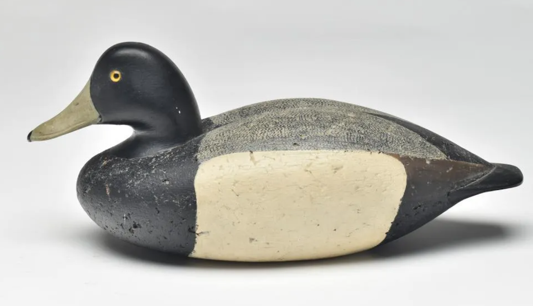 A cork body bluebill decoy by Charles E. ‘Shang’ Wheeler secured $9,500 plus the buyer’s premium in November 2021. Image courtesy of Guyette & Deeter, Inc. and LiveAuctioneers.
