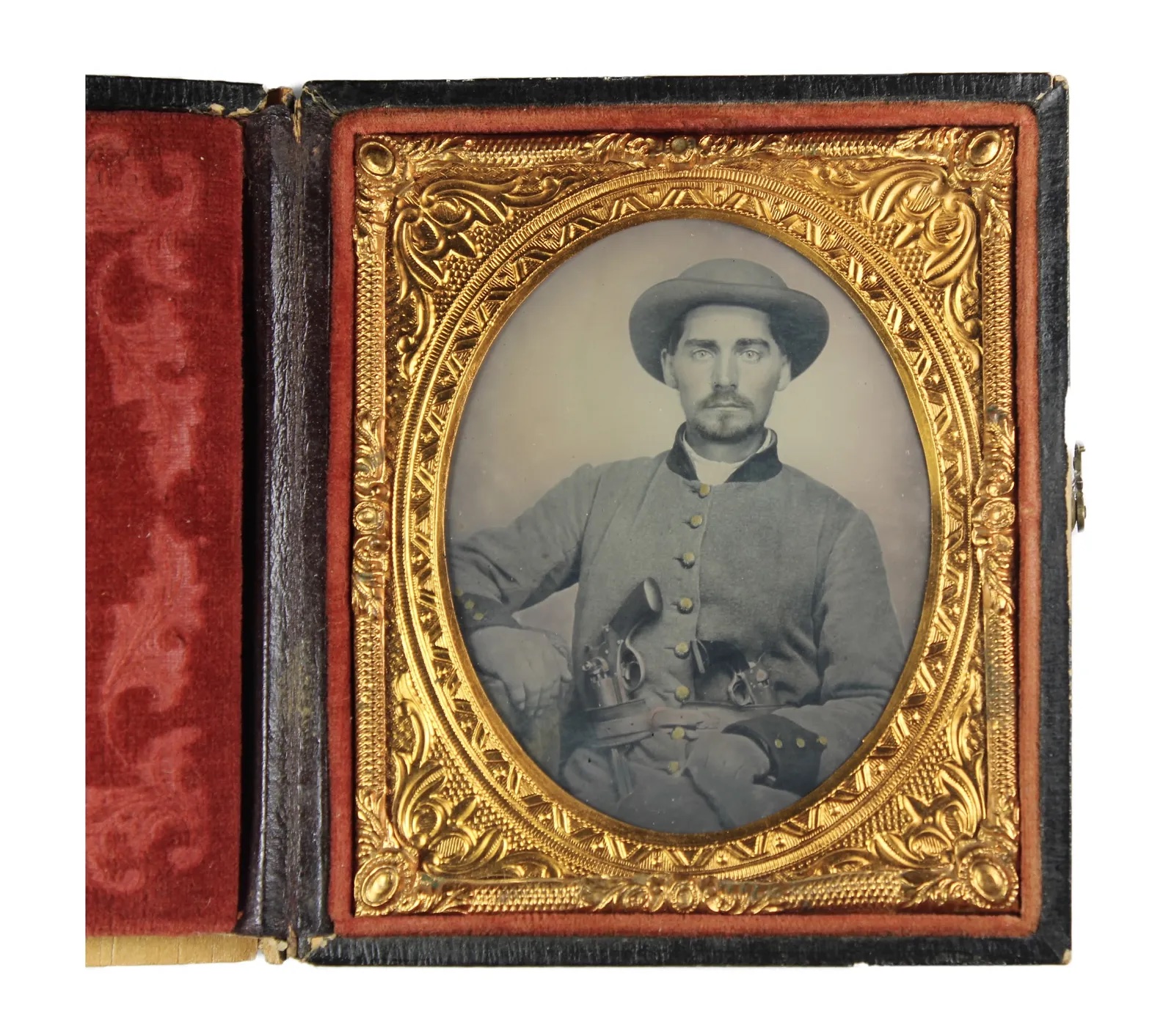 Ambrotype of a Confederate soldier with two large pistols tucked into his belt, one a rarely seen M1858 Starr revolver, which sold for $9,250 ($11,377 with buyer's premium) at Fleischer's.
