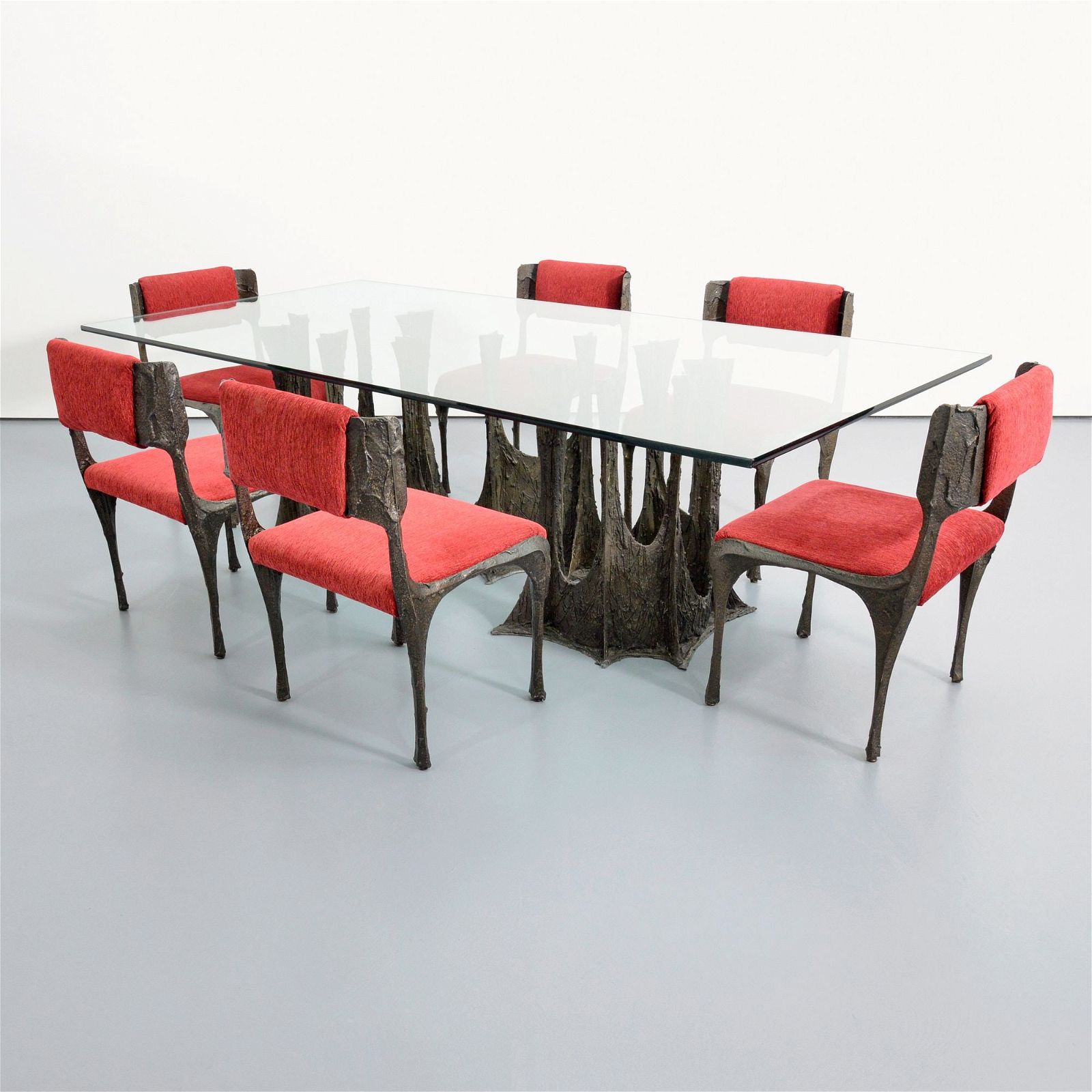 Visible in the lot images for both the Paul Evans side chairs and Stalagmite table are shots showing the furnishings together, as the consignor used them. Offered as separate, subsequent lots, the table sold for $26,800 and the chairs for $64,000 at Palm Beach Modern Auctions.
