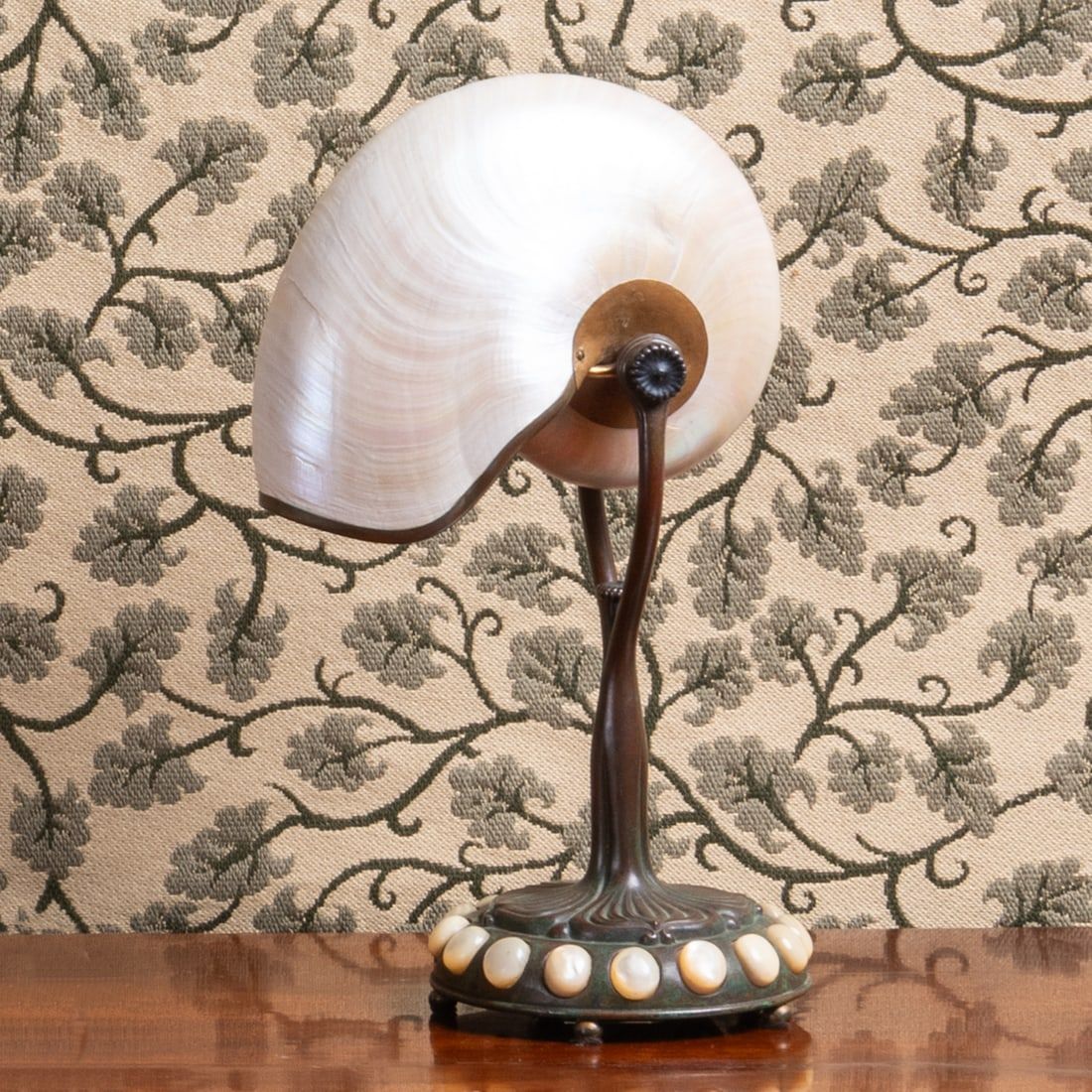 Tiffany bronze Nautilus shell desk lamp, which sold for $23,040 at Stair Galleries.
