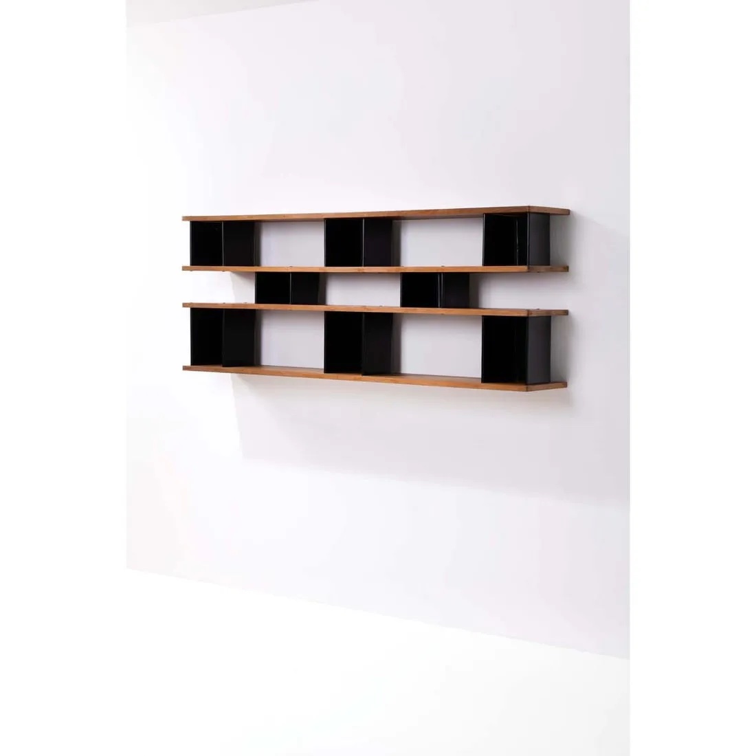 Charlotte Perriand, ‘Nuage’ wall-mounted bookshelf, estimated at €60,000-€90,000 ($65,320-$97,980) at Piasa.