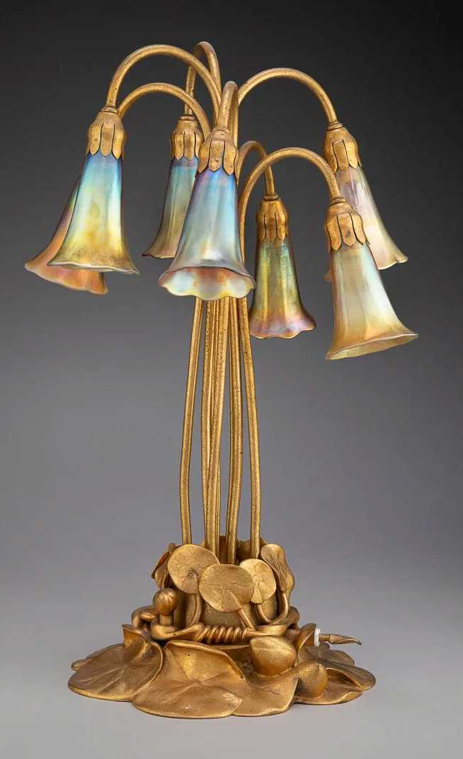 Tiffany Studios favrile glass and gilt bronze seven-light Lily lamp, estimated at $8,000-$10,000 at Heritage.