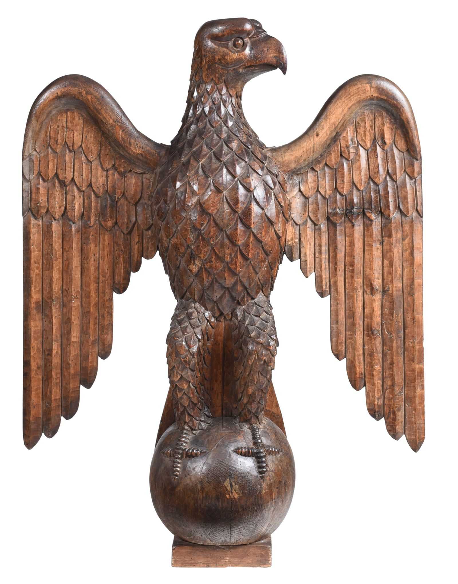 British or American late 19th- or early 20th-century spread-winged eagle carved from pine, estimated at $1,500-$2,500 at Brunk.