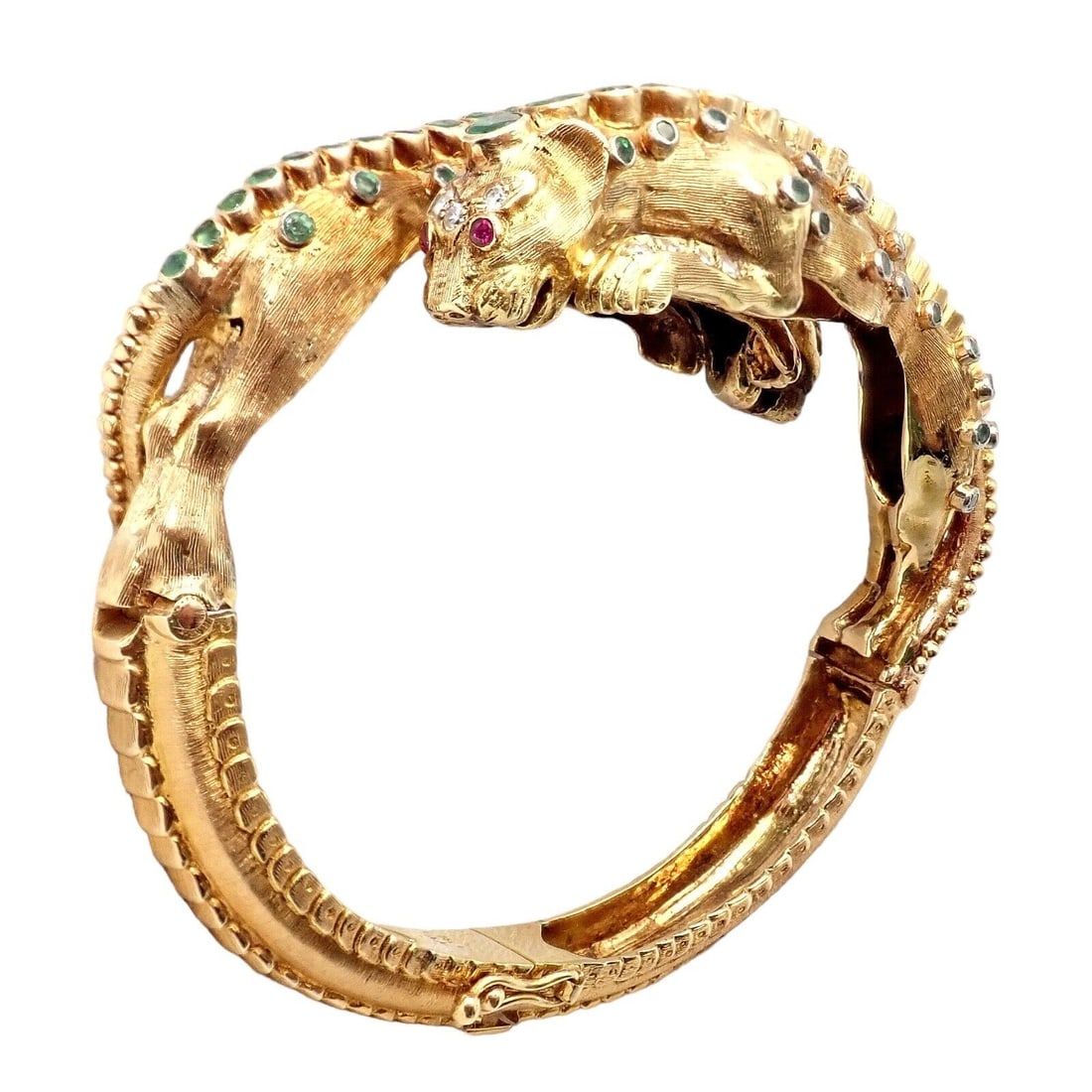 Ilias Lalaounis 18K gold, emerald, ruby, and diamond lioness bangle bracelet, estimated at $16,000-$19,000 at Jasper52.