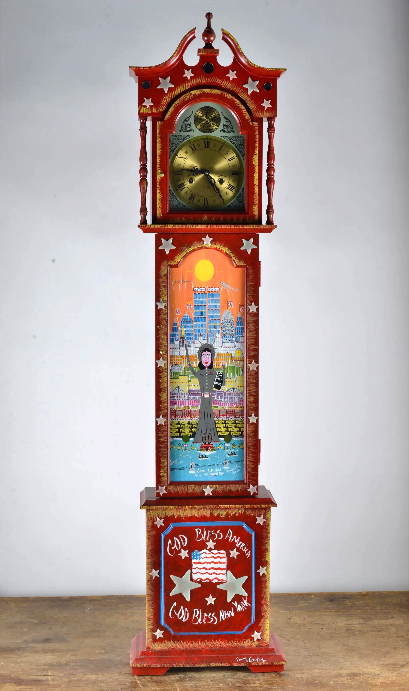 Benny Carter tall case clock with Statue of Liberty art, which hammered for $2,100 and sold for $2,625 with buyer’s premium at Ledbetter.