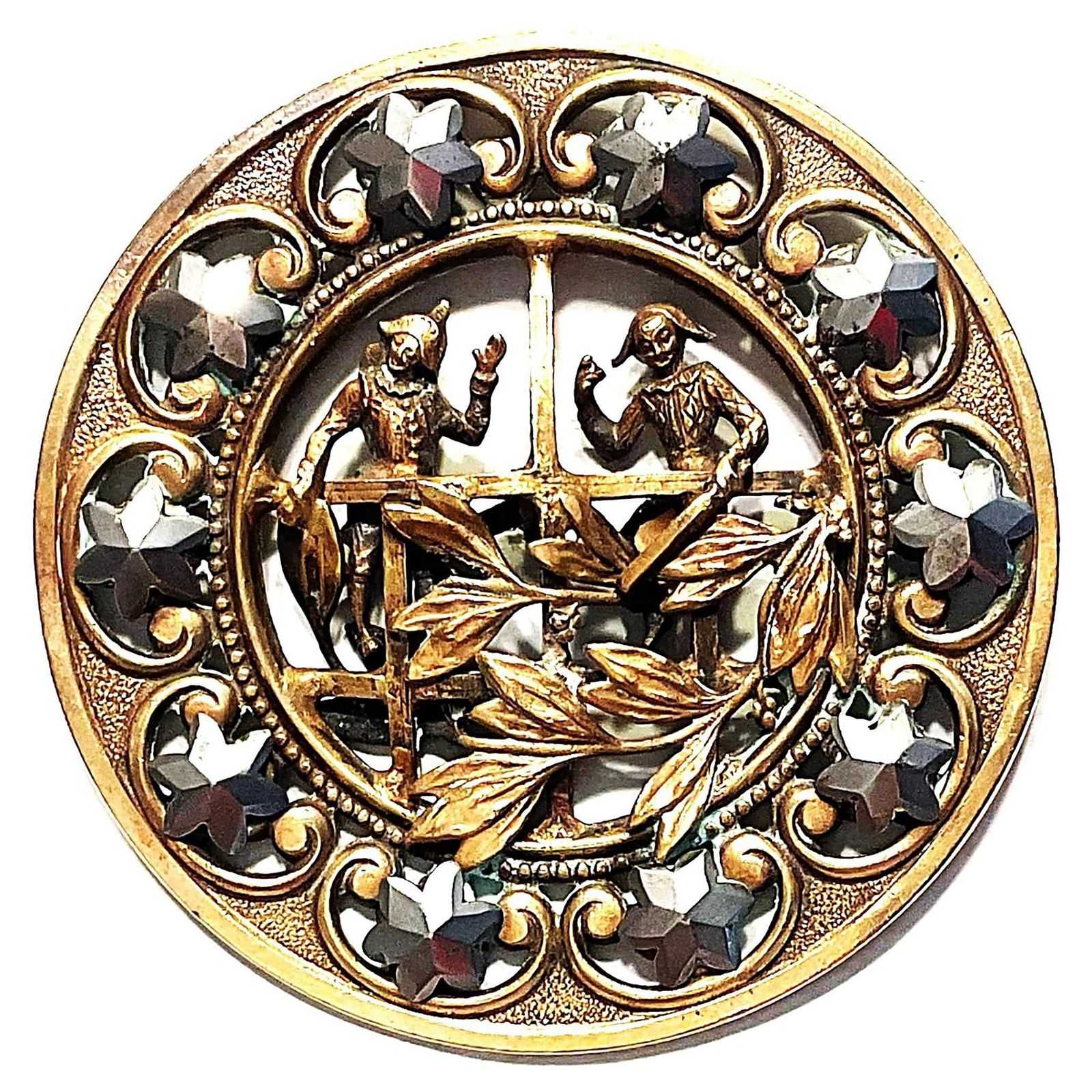 Extra-large 19th-century brass and steel Punchinello and Harlequin button, estimated at $1,000-$2,000 at Lion and Unicorn.