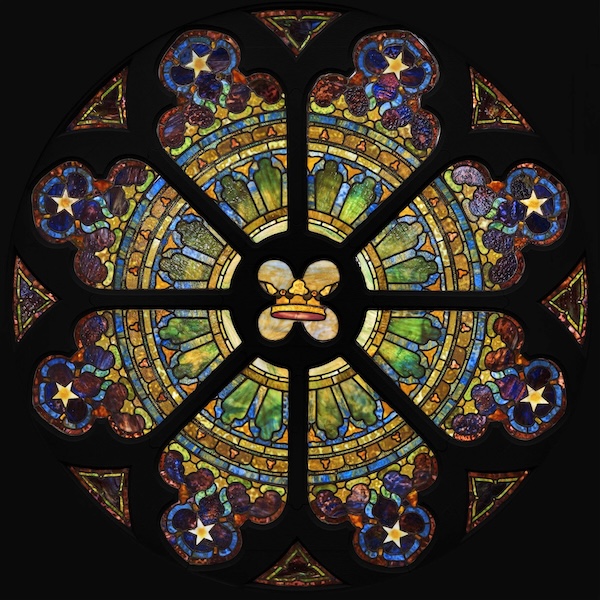One from a pair of circa-1905 Tiffany Studios Rose windows, featuring a crown at its center, made for St. Paul’s Presbyterian Church in Philadelphia and sold at Freeman’s Hindman in May 2023. Auctioned individually, each took $100,000 plus the buyer’s premium. Image courtesy of Freeman’s Hindman and LiveAuctioneers.