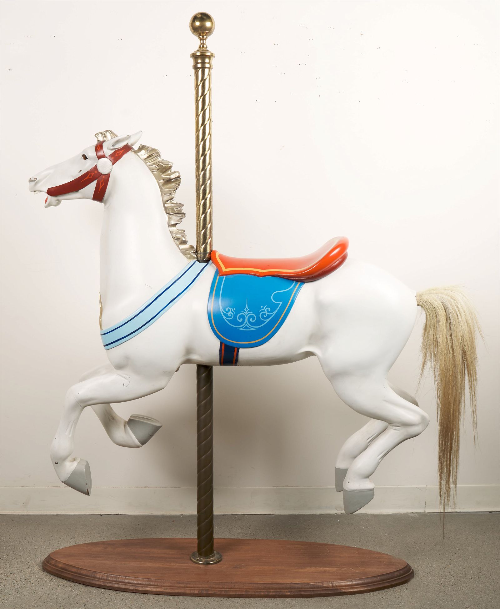 Carved and painted wood carousel horse dating to 1906, estimated at $3,000-$5,000 at Vallot Auctioneers.
