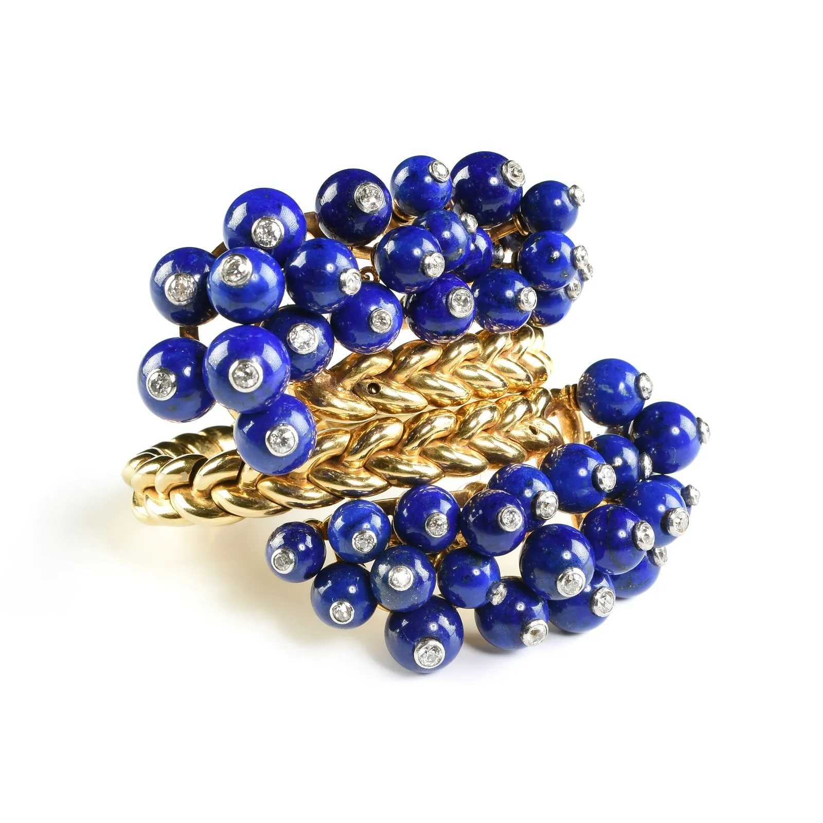 Cartier mid-century gold, natural lapis lazuli, and diamond cuff bracelet, which sold for $35,000 ($44,450 with buyer’s premium) at Simpson Galleries.