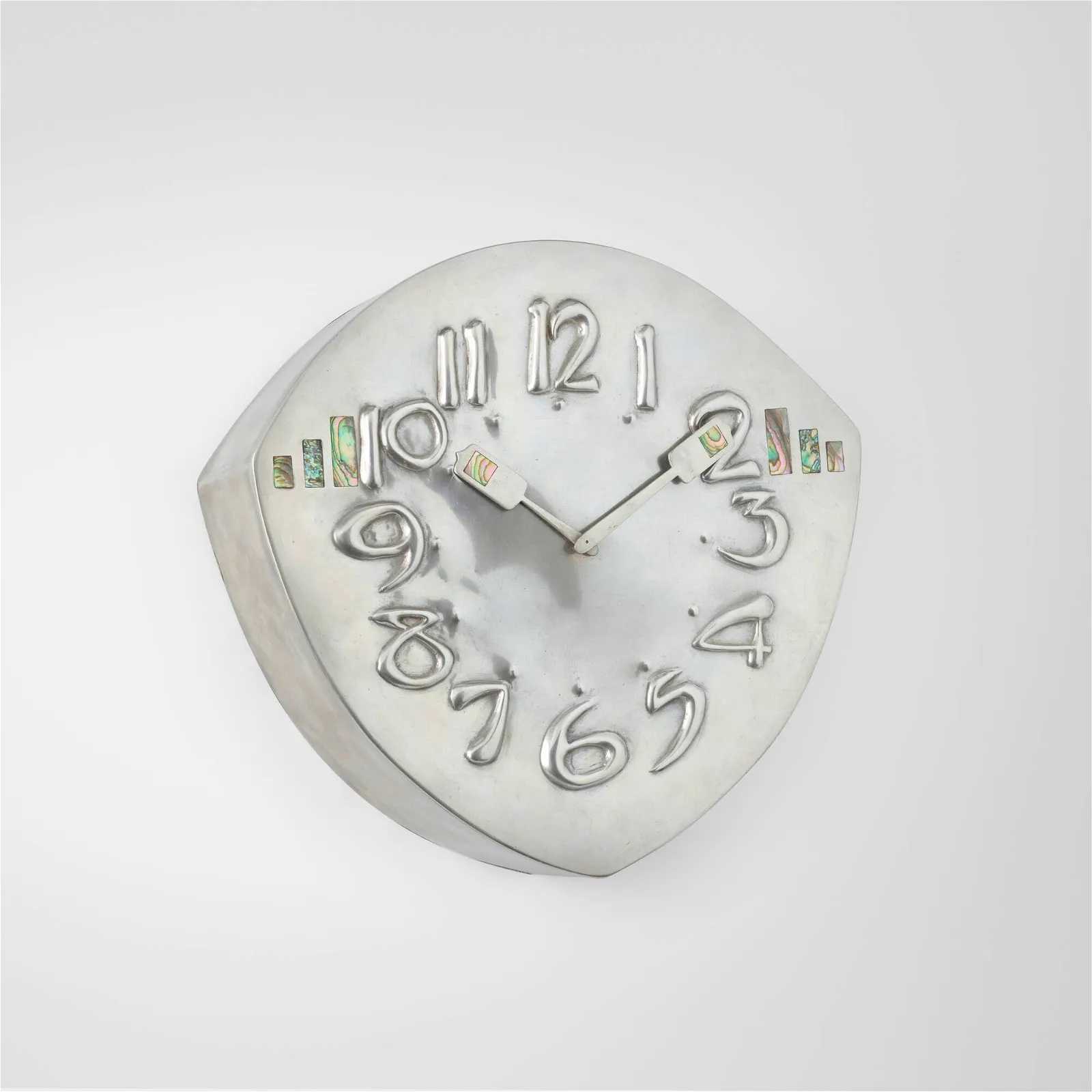 Archibald Knox Tudric wall clock, which sold for $11,000 ($14,410 with buyer’s premium) at Toomey.