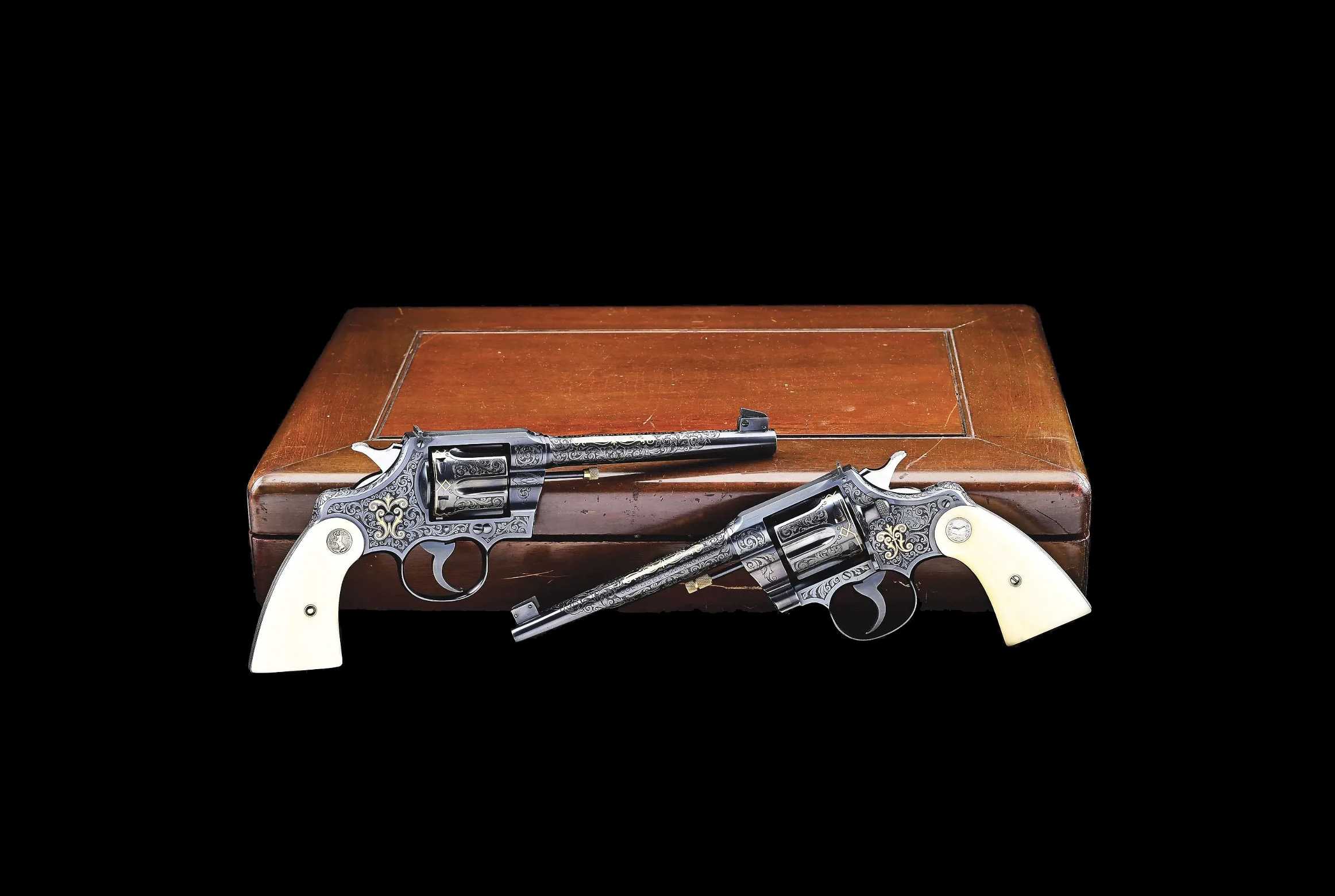 Exhibition Engraved & Gold Inlaid Colt Officers Model Double Action Revolvers, estimated at $75,000-$150,000 at Morphy.