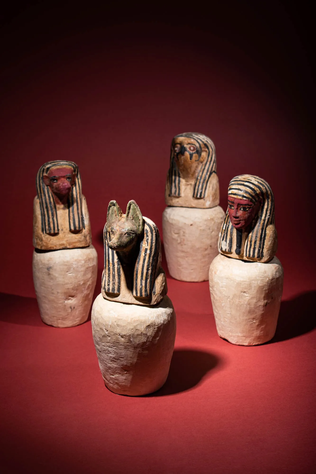 Egyptian Stone And Wood Pseudo-Canopic Jars, estimated at £12,000-£20,000 ($15,000-$25,000) at Apollo.