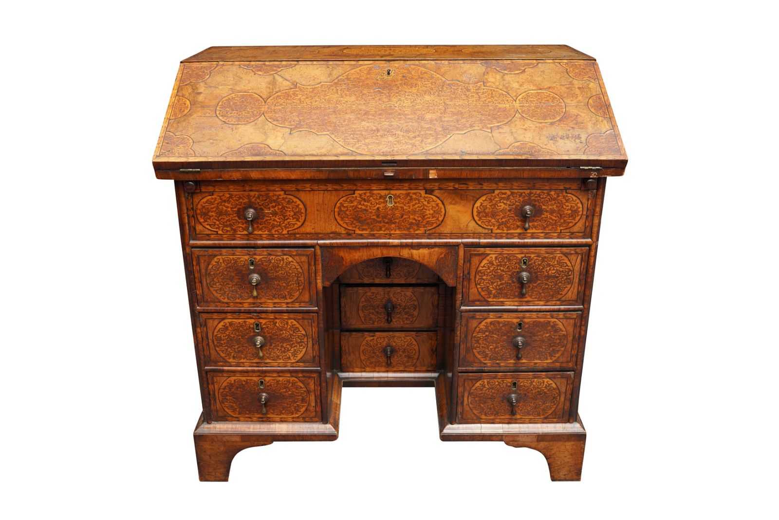 William and Mary marquetry-inlaid walnut bureau in the manner of Gerrit Jensen, which hammered for £15,000 ($18,690) and sold for £19,200 ($23,920) at Chiswick Auctions on April 7.