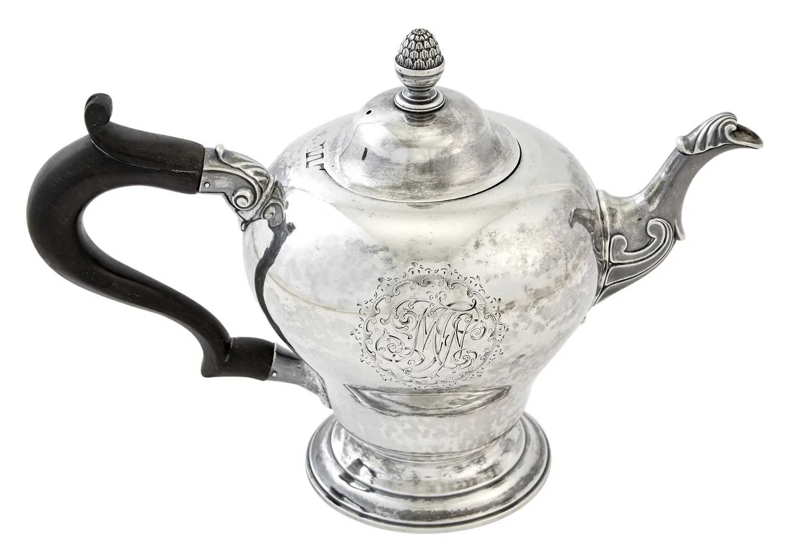 Circa 1762 Daniel Christian Fueter New York Colonial Silver Teapot, estimated at $6,000-$8,000 at Doyle.