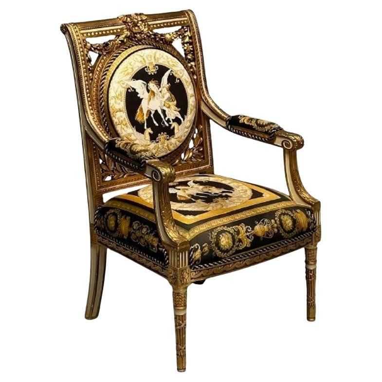 
Louis XVI-style French 1920s giltwood armchair, upholstered in Versace fabric, estimated at $15,000-$18,000 at Jasper52.
