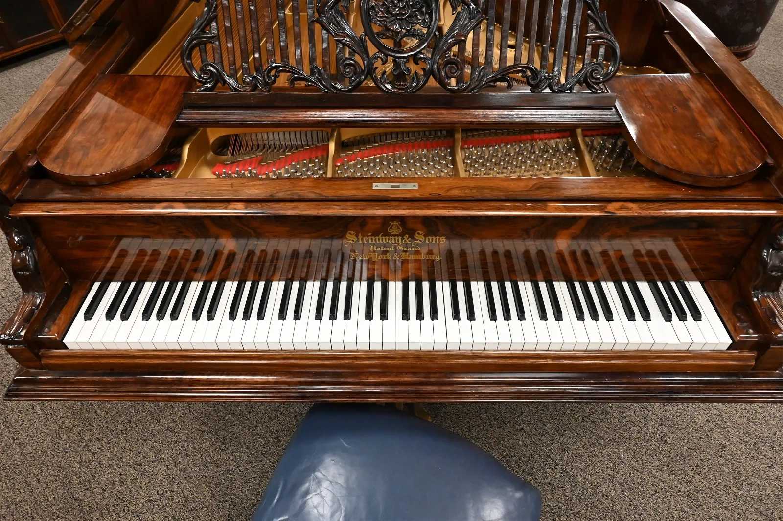 Detail of Steinway Rosewood Inlaid Model D Centennial Concert Grand Piano, estimated at $100,000-$150,000 at Nadeau's.