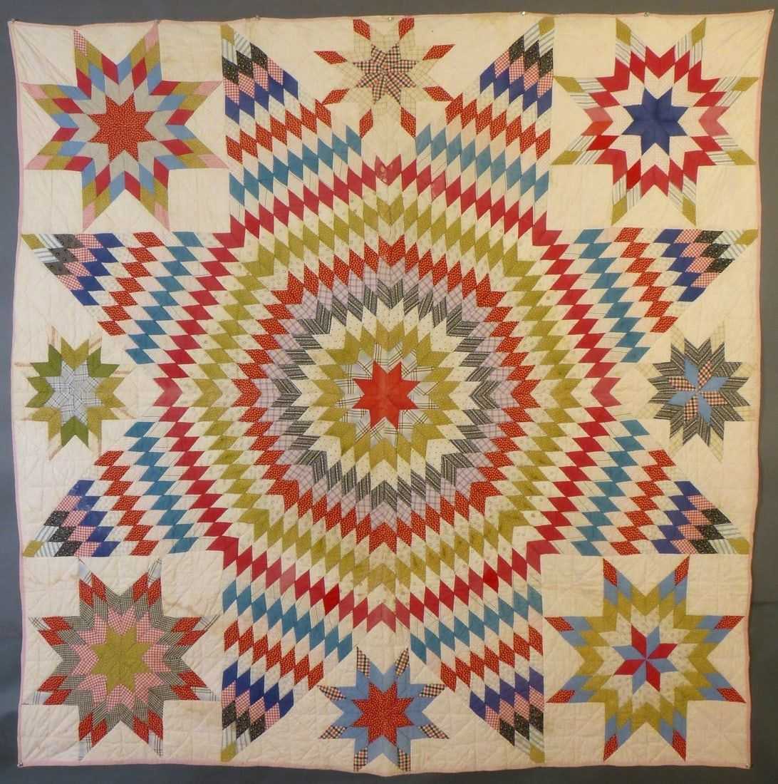 Circa-1900-1915 cotton quilt with a Lone Star or Star of Texas variation pattern, estimated at $800-$1,000 at Jasper52.