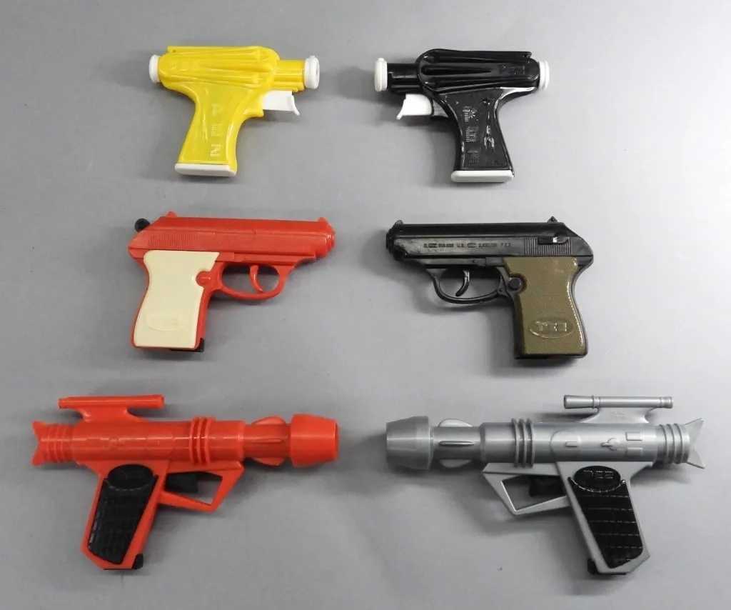 PEZ Ray Gun Shooter Dispenser Group, estimated at $200-$400 at Bruneau.