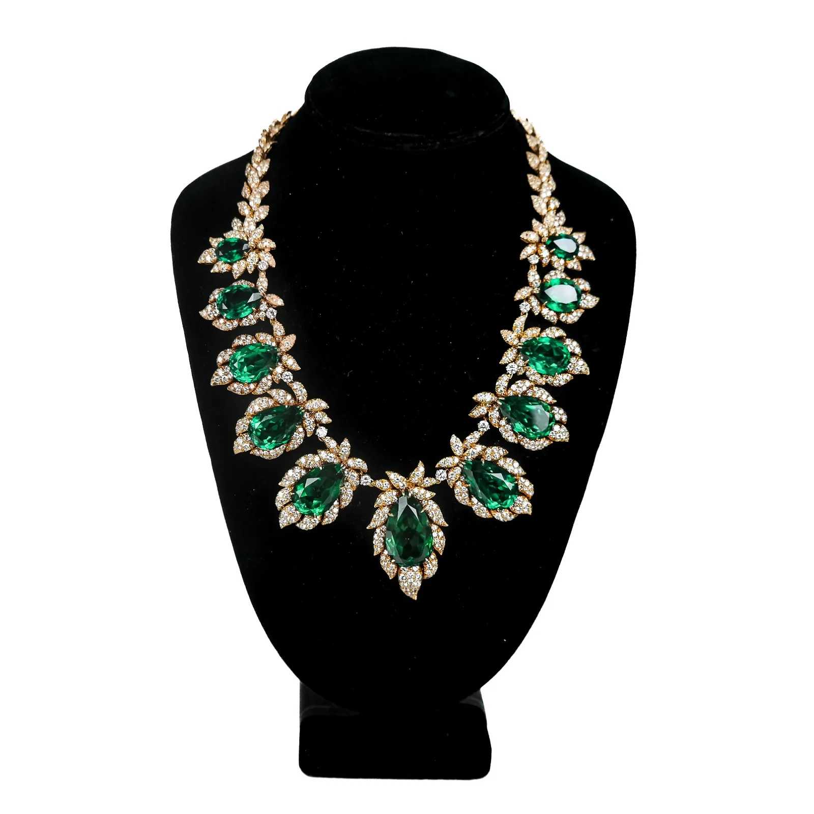 Harry Winston Diamond, Emerald-Simulant, and Gold Necklace, estimated at $60,000-$80,000 at Roland NY.