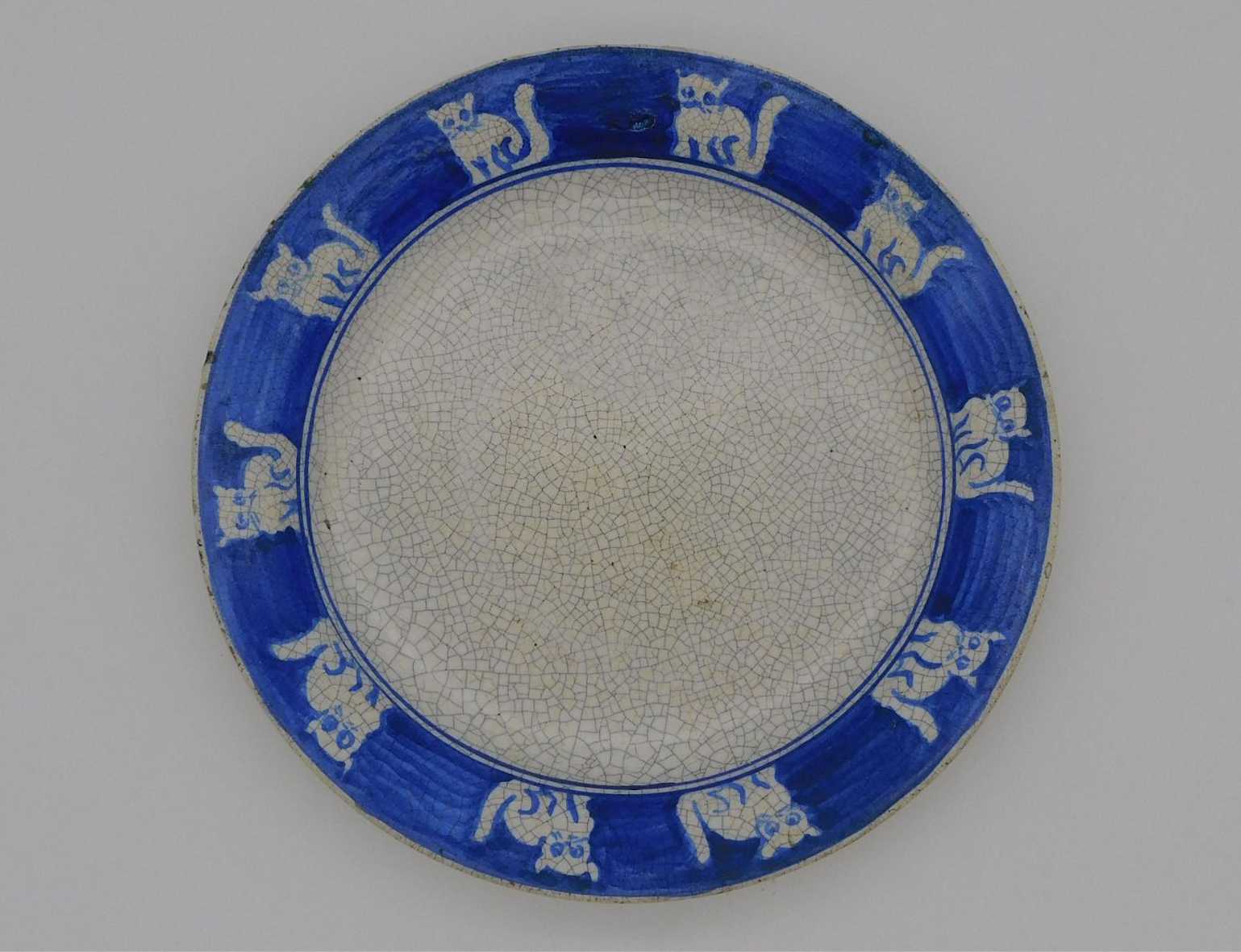 This early Dedham Pottery plate having a repeating cat border went out at $3,600 plus the buyer’s premium in April 2023. Image courtesy of Marion Antique Auctions and LiveAuctioneers.