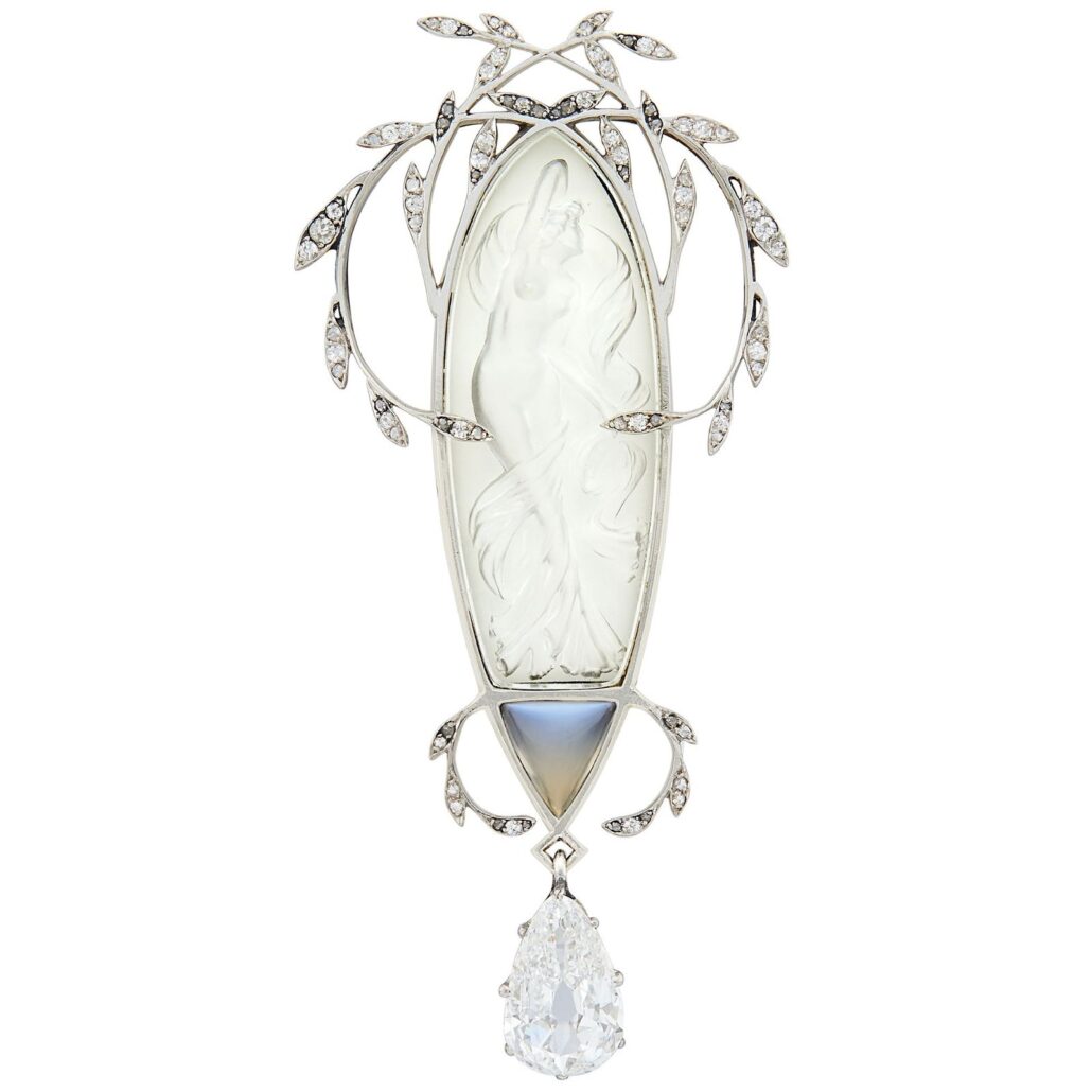René Lalique Art Nouveau platinum, carved rock crystal, moonstone, and diamond garland brooch, estimated at $15,000-$20,000 at Doyle New York April 18.