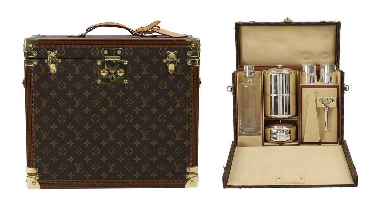 Bespoke Louis Vuitton traveling bar with silver elements by Christofle, estimated at ££18,000-£22,000 ($22,855-$27,935) at Sworders.
