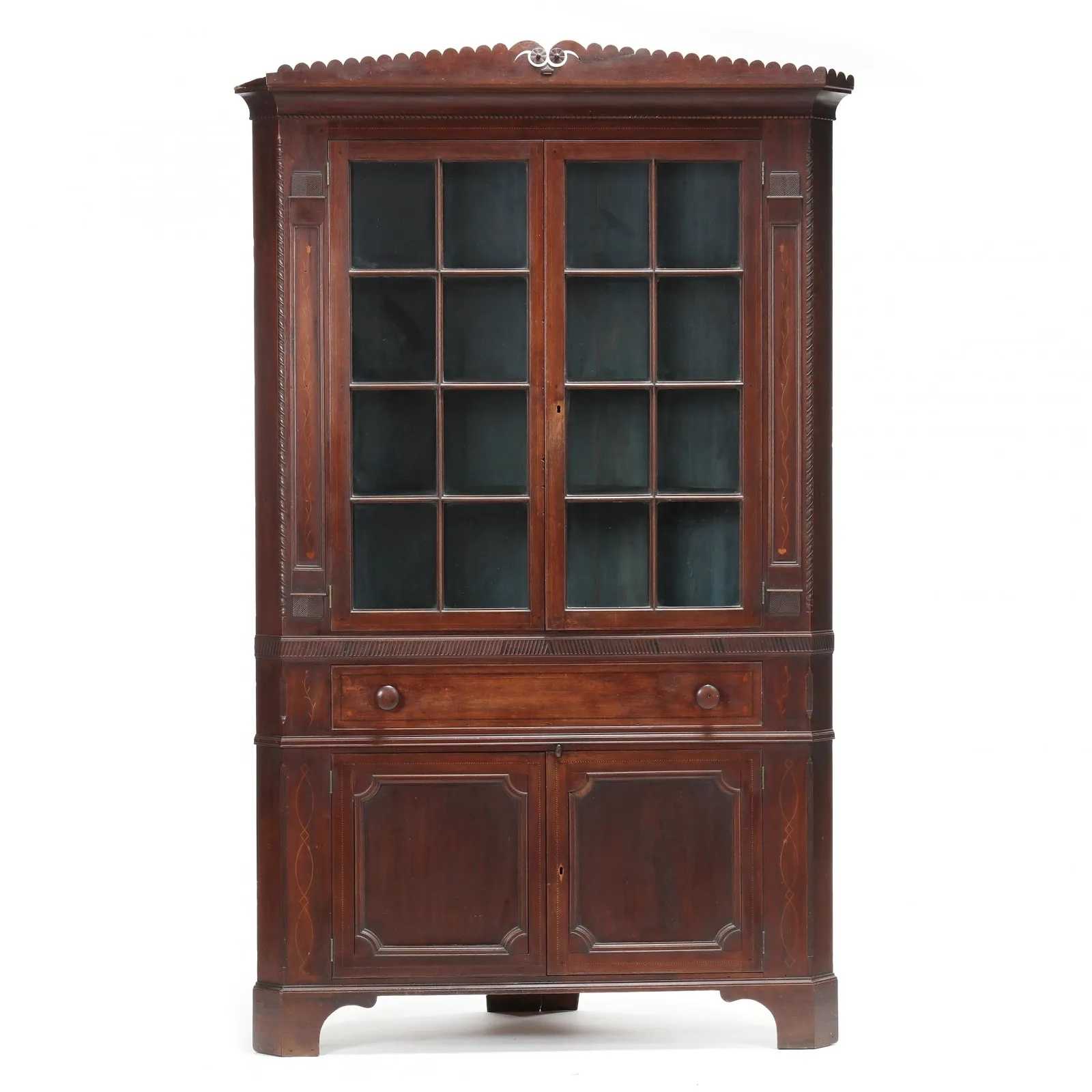Inlaid walnut corner cupboard made by John Swisegood, which hammered for $33,000 and sold for $41,250 with buyer’s premium at Leland Little on March 15.