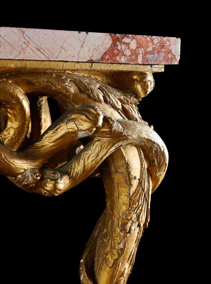 Detail from one of a circa-1770 pair of Italian giltwood tables with brecce pernice marble tops, which hammered for £220,000 ($278,675) and sold for £288,200 ($289,060) with buyer’s premium at Lyon & Turnbull on March 27.
