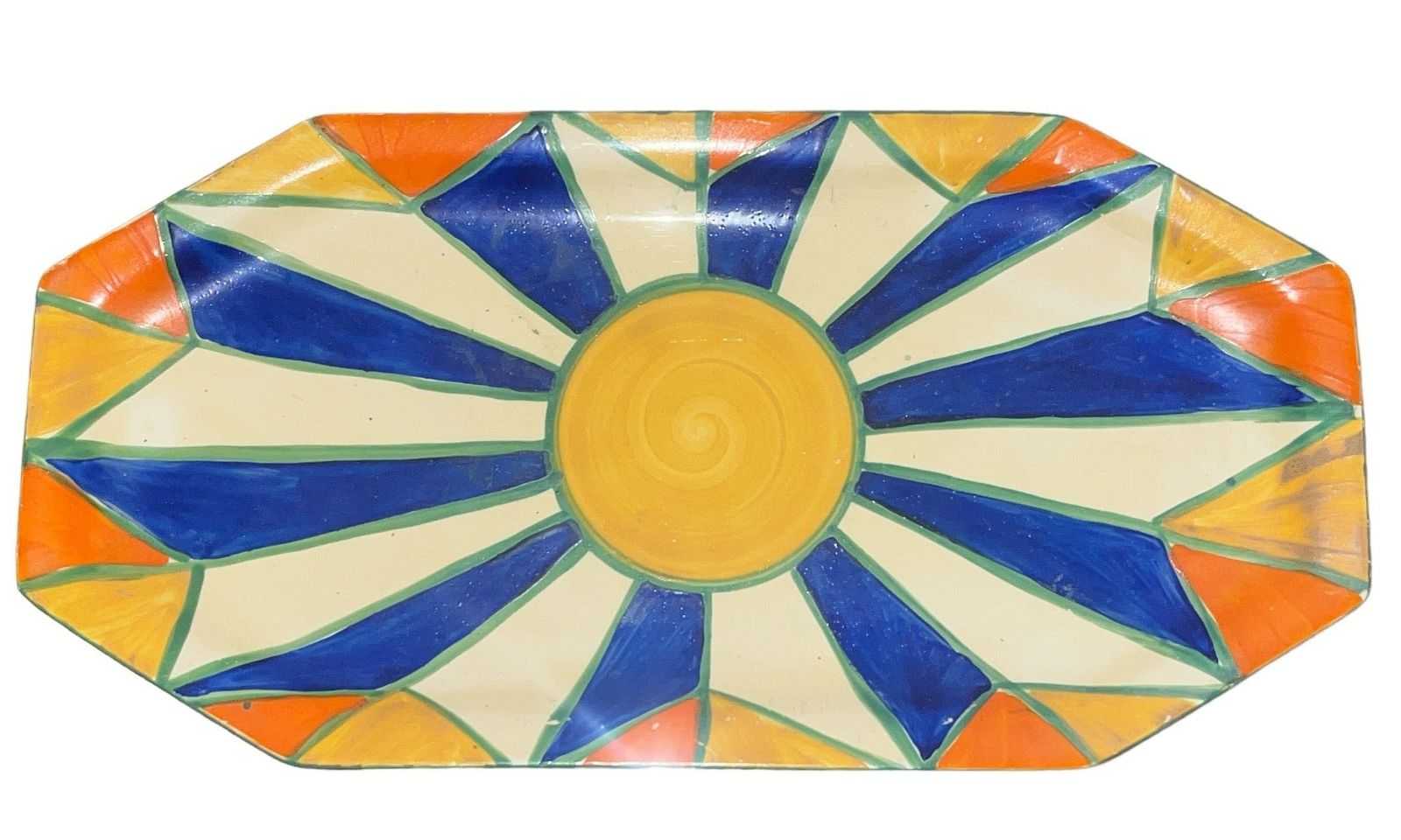Clarice Cliff Bizarre ware pottery dish with a sunburst pattern, estimated at $200-$400 at Rivich Auction.