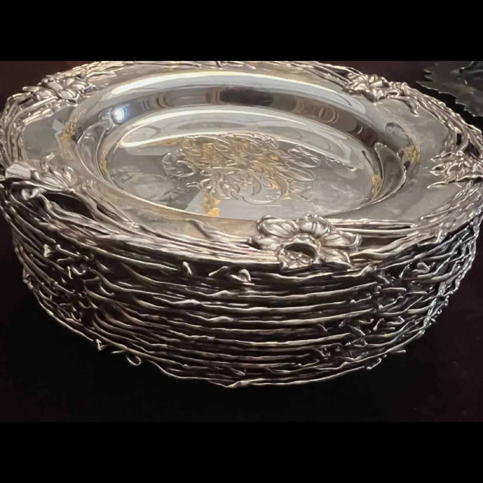 Lebolt Sterling Silver Bread And Butter Set of 12 Plates, estimated at $1,500-$2,000 at SJ Auctioneers.