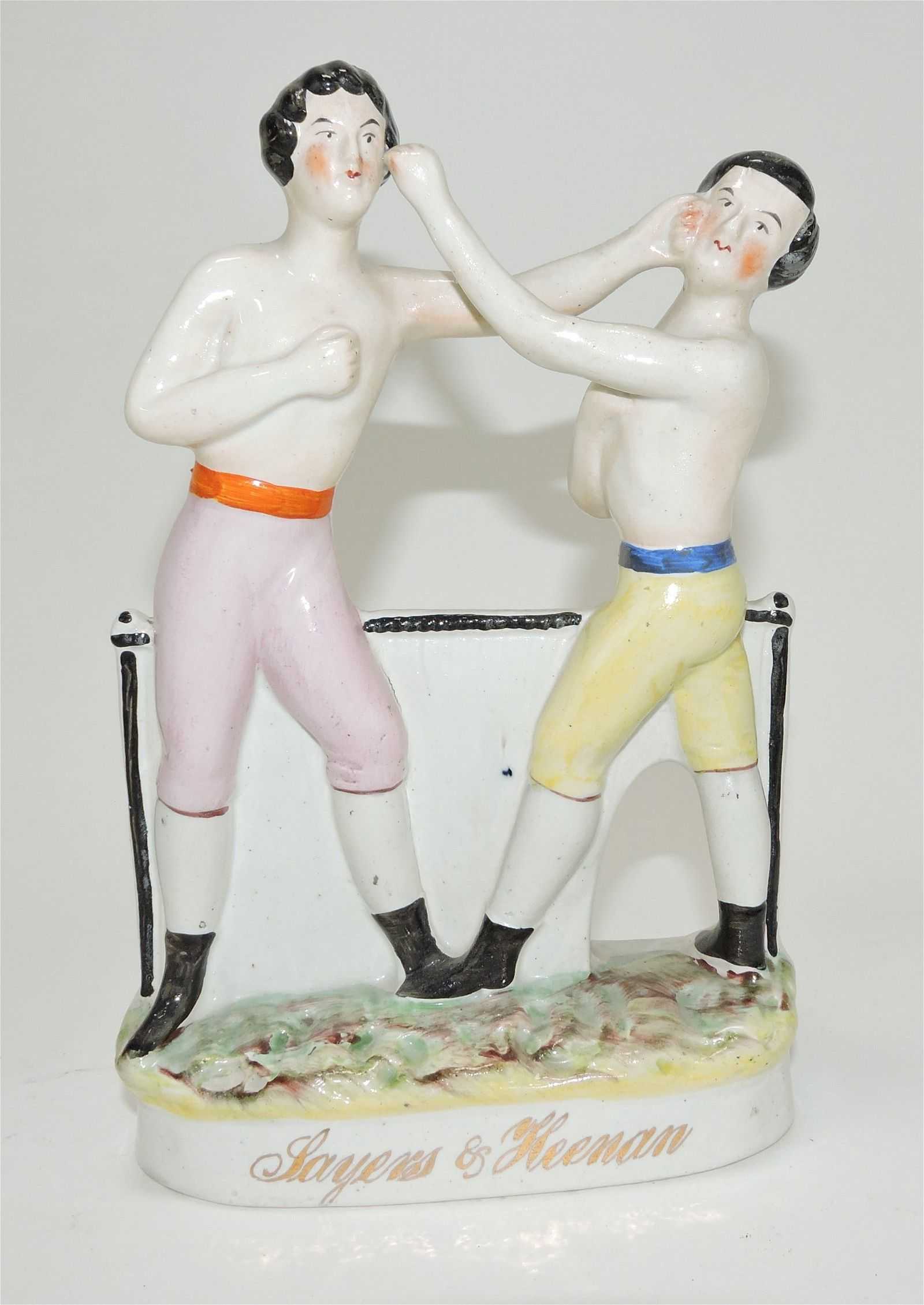 Staffordshire figural group depicting a historic 1860 boxing match, estimated at $200-$300 at Strawser Auction Group on May 24.